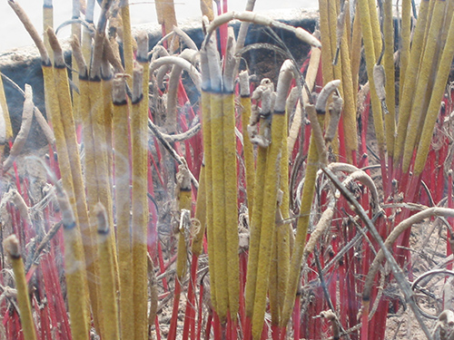 Incense burning outside a Buddhist temple | by Vectis Karma | Online Incense Shop