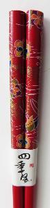 Red Lacquered wooden chopsticks with Flower images on handles Red Lacquered wooden chopsticks with Flower images on handles